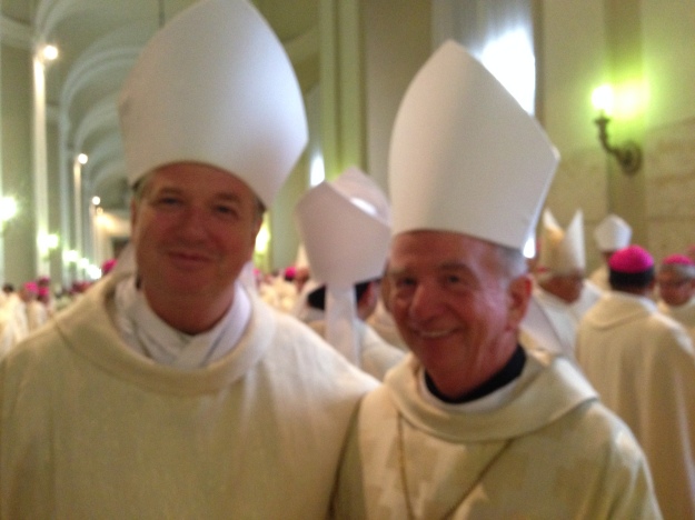 Bishop Bob McGuckin, Bishop of Toowoomba and I before we process out. 